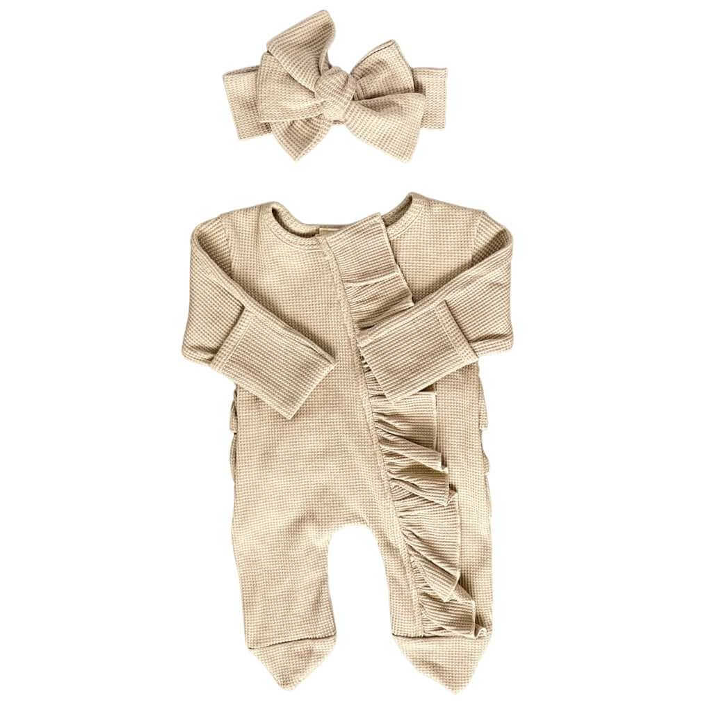 Beige baby girl ruffled zip up pajamas in thermal waffle knit fabric with headband. Sassy Jo's Babies and Bows. 